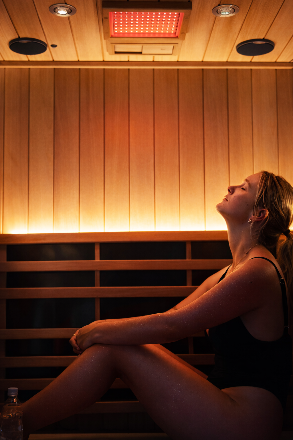 Guest beneath the red light panel